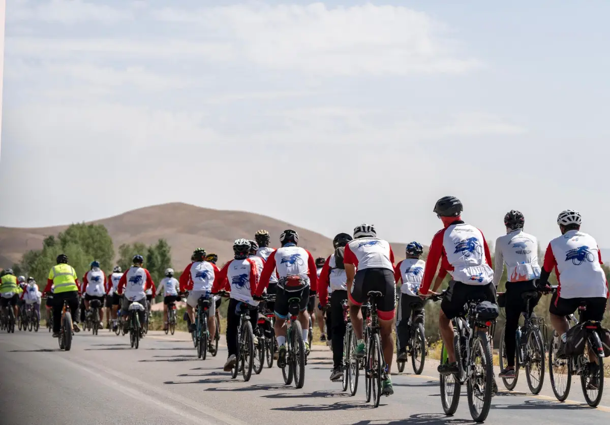 Road bicycle race representing high-performance composite sports equipment applications